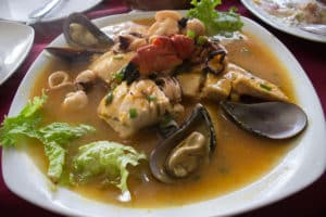 Parihuela is a spicy seafood stew similar to the French bouillabaisse but with more intense flavors. 
